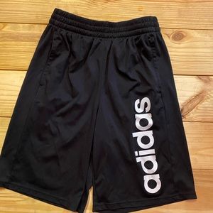 Adidas boys large shorts in black. Clean. Little wear.